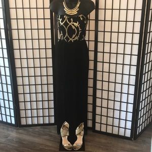 A long black and gold dress